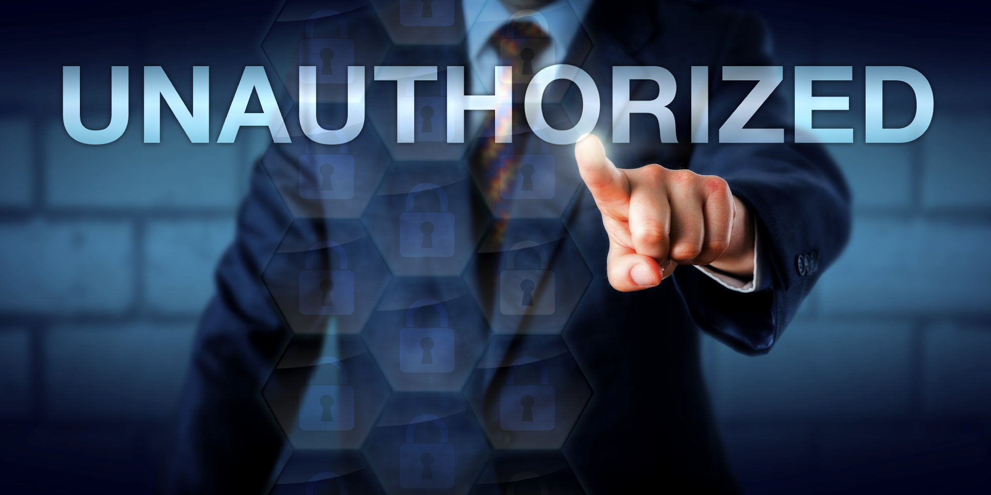 Manager Touching The Word UNAUTHORIZED Onscreen on silverlaw.com